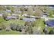 Aerial view of a charming house with lush greenery, mature trees, and a well-maintained yard at 7170 Janean Dr, Brownsburg, IN 46112