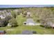 Overhead view of a home with a spacious yard and mature trees, set in a quiet neighborhood at 7170 Janean Dr, Brownsburg, IN 46112