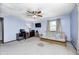 Living room featuring a futon, a desk, neutral-colored walls, and ample space at 7170 Janean Dr, Brownsburg, IN 46112
