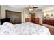 Comfortable main bedroom featuring a ceiling fan, closet, ensuite bathroom, and neutral colors at 7170 Janean Dr, Brownsburg, IN 46112
