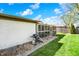View of the backyard with a grill and a screened-in porch at 731 Oak Dr, Greenwood, IN 46142