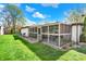 View of the backyard with a covered patio at 731 Oak Dr, Greenwood, IN 46142