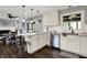 Kitchen with stainless steel appliances that opens to a dining area and living room at 731 Oak Dr, Greenwood, IN 46142