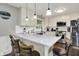 Kitchen featuring a long countertop with barstool seating and pendant lighting at 731 Oak Dr, Greenwood, IN 46142