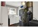 Bright laundry room with washer, dryer, utility equipment, and a window for natural light at 731 Oak Dr, Greenwood, IN 46142