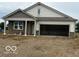 Charming single Gathering home with a two-car garage and covered front porch at 7533 Big Bend Blvd, Camby, IN 46113