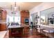 Spacious kitchen with granite countertops, modern island and seamless transition to living spaces at 7594 W Williamswood Dr, New Palestine, IN 46163