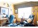 Office area features desk, chair, and decor at 7594 W Williamswood Dr, New Palestine, IN 46163