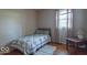 Bedroom featuring a bed, hardwood floors, and natural light from the window at 7825 N County Road 650 E, Brownsburg, IN 46112