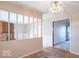 Inviting entryway with a view to the living area, showcasing the fireplace and wood accents at 7825 N County Road 650 E, Brownsburg, IN 46112