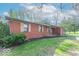 Well-maintained brick home with manicured lawn and fresh mulch at 7825 N County Road 650 E, Brownsburg, IN 46112