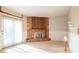 Comfortable living room featuring a fireplace and sliding glass door at 7825 N County Road 650 E, Brownsburg, IN 46112