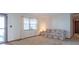 Cozy living room featuring a large window and comfortable seating at 7825 N County Road 650 E, Brownsburg, IN 46112