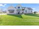 Beautiful two-story home with a well-manicured lawn, showcasing curb appeal at 8083 Easton Ln, Zionsville, IN 46077