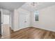 Bedroom featuring modern closet doors, and wood-look floors at 8083 Easton Ln, Zionsville, IN 46077