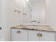 Modern bathroom with stone countertop and elegant vanity at 8083 Easton Ln, Zionsville, IN 46077