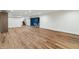 Finished basement with hardwood flooring, recessed lighting, and a relaxing sitting area at 8083 Easton Ln, Zionsville, IN 46077