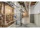 Spacious unfinished basement featuring exposed ducts, framing, and a new Bryant HVAC system at 8083 Easton Ln, Zionsville, IN 46077