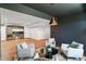 Finished basement with accent lighting, wet bar, and contemporary furnishings at 8083 Easton Ln, Zionsville, IN 46077