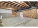 Partially finished basement with exposed rafters, concrete flooring, and ready for customization at 8083 Easton Ln, Zionsville, IN 46077