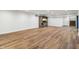 Expansive finished basement with luxury vinyl plank, wet bar, and stairs leading to the main floor at 8083 Easton Ln, Zionsville, IN 46077