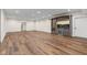 Finished basement with hardwood floors and a wet bar, complete with a beverage fridge and microwave at 8083 Easton Ln, Zionsville, IN 46077