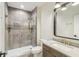 Modern bathroom featuring a glass-enclosed shower and vanity with a dark wood cabinet at 8083 Easton Ln, Zionsville, IN 46077