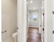 View of a hallway showing a bathroom and walk-in closet at 8083 Easton Ln, Zionsville, IN 46077