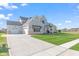 Spacious two-story home with an attached garage, set on a green lawn at 8083 Easton Ln, Zionsville, IN 46077