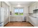 This kitchen features shaker cabinets and stainless steel appliances at 8083 Easton Ln, Zionsville, IN 46077