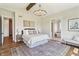 Stunning main bedroom with a decorative chandelier and ensuite bathroom access at 8083 Easton Ln, Zionsville, IN 46077