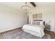 Spacious main bedroom featuring a tray ceiling and large windows for ample light at 8083 Easton Ln, Zionsville, IN 46077