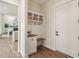 Mudroom with built-in storage and convenient bench at 8083 Easton Ln, Zionsville, IN 46077