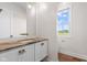 Modern bathroom with an elegant vanity and stone countertop at 8083 Easton Ln, Zionsville, IN 46077