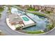 A high shot of the pool house in the middle of a pond, including community buildings at 8651 Jaffa Court East Dr # 18, Indianapolis, IN 46260