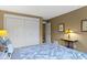 Bedroom featuring a comfortable bed, closet and soft lighting at 8651 Jaffa Court East Dr # 18, Indianapolis, IN 46260