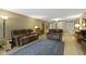 Spacious living room with hardwood floors, comfortable seating, and ample natural light at 8651 Jaffa Court East Dr # 18, Indianapolis, IN 46260