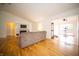 Bright living room featuring hardwood floors, a fireplace, and an open layout at 9143 Warwick Rd, Indianapolis, IN 46240