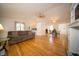 Spacious living room with wood floors, fireplace, and open floor plan at 9143 Warwick Rd, Indianapolis, IN 46240