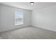 Bright bedroom with neutral carpet, offering a serene and inviting atmosphere at 9318 Windrift Way, Zionsville, IN 46077