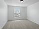 Bright bedroom with neutral carpet, offering a serene and inviting atmosphere at 9318 Windrift Way, Zionsville, IN 46077