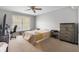Bright bedroom featuring a large window and neutral decor at 933 Hummingbird Ln, Columbus, IN 47203