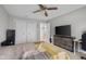 Comfortable bedroom with gray walls and large closet for plenty of storage at 933 Hummingbird Ln, Columbus, IN 47203
