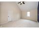 Large bedroom with vaulted ceiling and neutral carpeting at 950 Nevelle Ln, Carmel, IN 46032