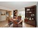 Spacious office with hardwood floors and a large window for ample natural light at 950 Nevelle Ln, Carmel, IN 46032