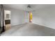 Bright bedroom featuring carpet and doorways to a bathroom and closet at 961 Parkside Dr, Columbus, IN 47203