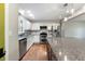 Well-appointed kitchen with stainless steel appliances, granite countertops, and ample storage at 961 Parkside Dr, Columbus, IN 47203