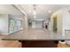 Granite island in kitchen overlooking living area fireplace at 961 Parkside Dr, Columbus, IN 47203