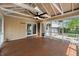This beautiful covered porch offers an outdoor space to relax and enjoy the scenery at 961 Parkside Dr, Columbus, IN 47203