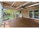 This beautiful covered porch offers an outdoor space to relax and enjoy the scenery at 961 Parkside Dr, Columbus, IN 47203